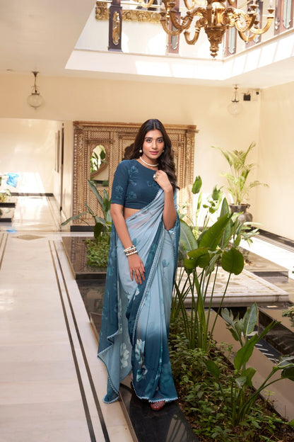 Teal Blue Weightless Marble Printed Saree with Floral Design Lace Border