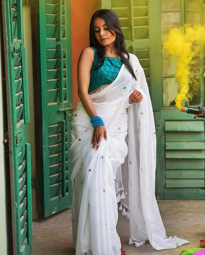 White Georgette Thread Work Saree with Teal Blue Sleeveless Blouse