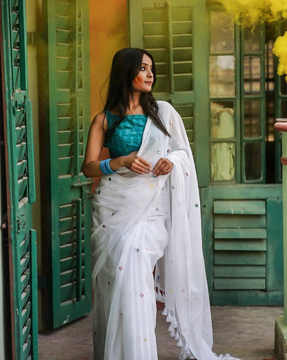 White Georgette Thread Work Saree with Teal Blue Sleeveless Blouse