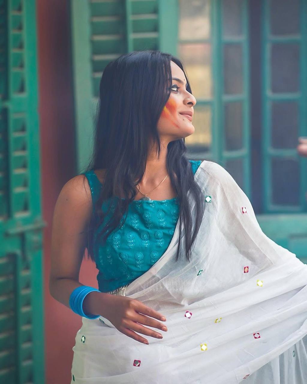 White Georgette Thread Work Saree with Teal Blue Sleeveless Blouse