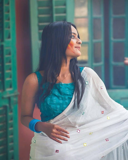 White Georgette Thread Work Saree with Teal Blue Sleeveless Blouse