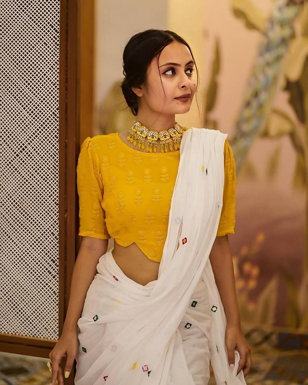 White Georgette Thread Work Saree with Yellow Sleeveless Blouse