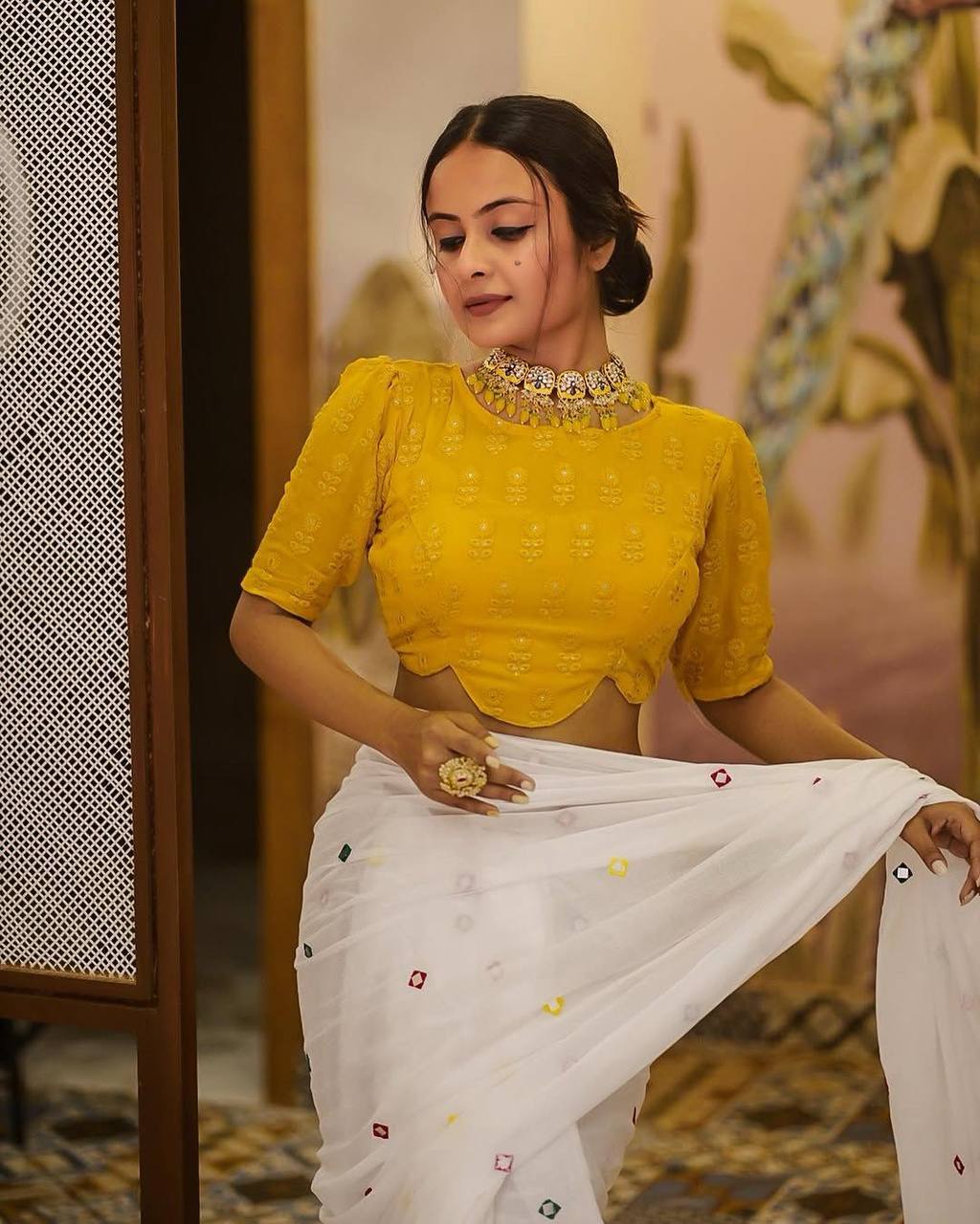 White Georgette Thread Work Saree with Yellow Sleeveless Blouse