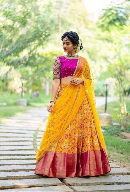 Yellow Kanchipuram Silk Lehenga Choli with Zari Weaving Net Dupatta