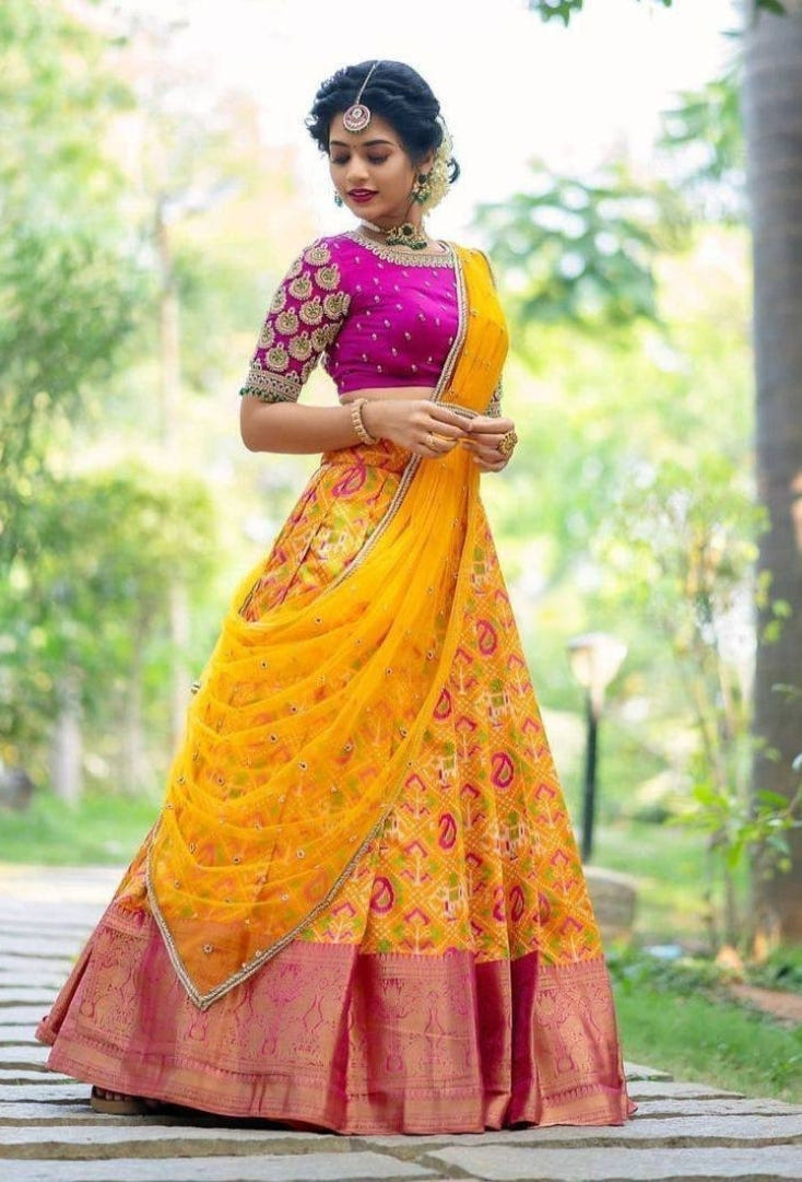 Yellow Kanchipuram Silk Lehenga Choli with Zari Weaving Net Dupatta