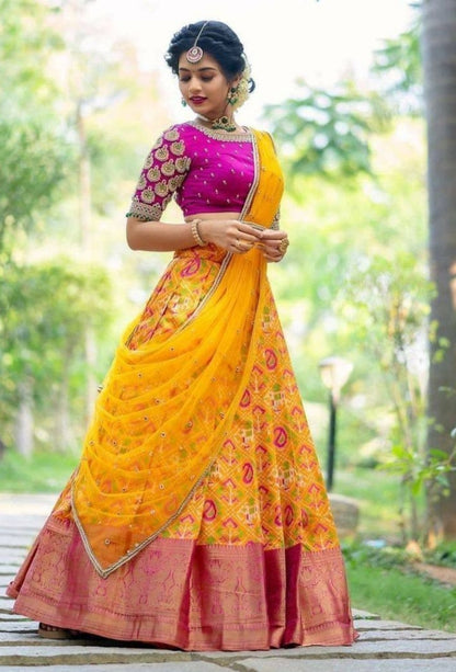 Yellow Kanchipuram Silk Lehenga Choli with Zari Weaving Net Dupatta
